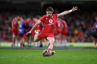140326 - Wales v Italy - Guinness Men's Six Nations - Dan Edwards of Wales kicks the conversion