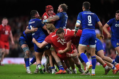 140326 - Wales v Italy - Guinness Men's Six Nations - James Botham of Wales is challenged by Niccolo Cannone of Italy