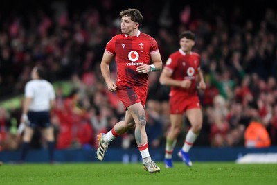 140326 - Wales v Italy - Guinness Men's Six Nations - Dan Edwards of Wales celebrates with team mates after kicking the ball to score a drop goal
