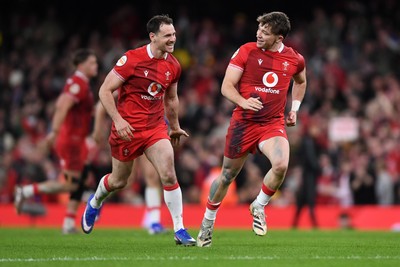 140326 - Wales v Italy - Guinness Men's Six Nations - Dan Edwards of Wales celebrates with team mates after kicking the ball to score a drop goal