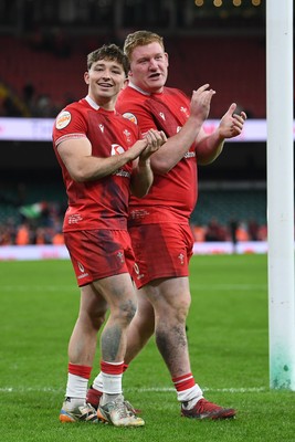 140326 - Wales v Italy - Guinness Men's Six Nations - Dan Edwards of Wales and Rhys Carre of Wales celebrate the win at full time