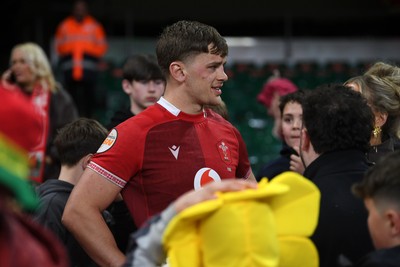 140326 - Wales v Italy - Guinness Men's Six Nations - Alex Mann of Wales with family at full time