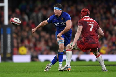 140326 - Wales v Italy - Guinness Men's Six Nations - Michele Lamaro of Italy is challenged by James Botham of Wales