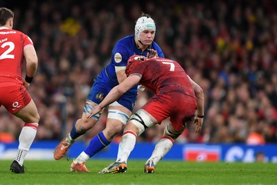 140326 - Wales v Italy - Guinness Men's Six Nations - Manuel Zuliani of Italy is challenged by James Botham of Wales