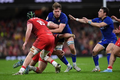 140326 - Wales v Italy - Guinness Men's Six Nations - Niccolo Cannone of Italy is challenged by Adam Beard of Wales