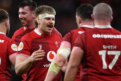 140326 - Wales v Italy - Guinness Men's Six Nations - Aaron Wainwright of Wales celebrates the win at full time