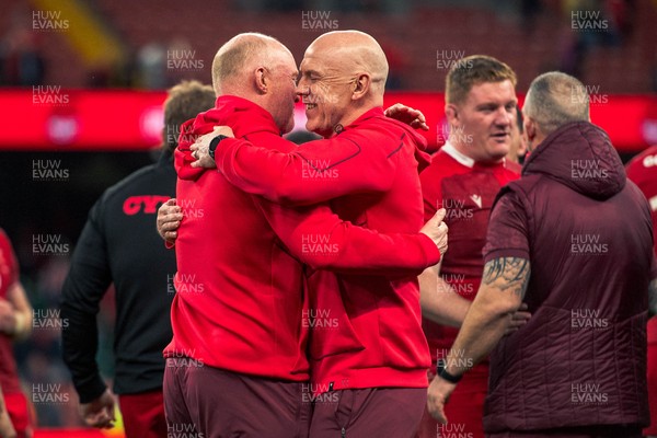 140326 - Wales v Italy - Guinness Six Nations - Neil Jenkins embraces  Head coach Steve Tandy after the game 