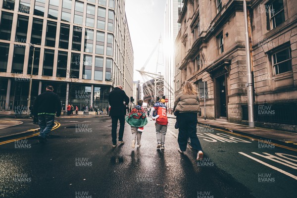140326 - Wales v Italy - Guinness Six Nations - Fans approach Principality Stadium ahead of the game 