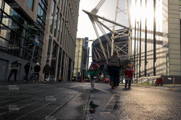 140326 - Wales v Italy - Guinness Six Nations - Fans approach Principality Stadium ahead of the game 