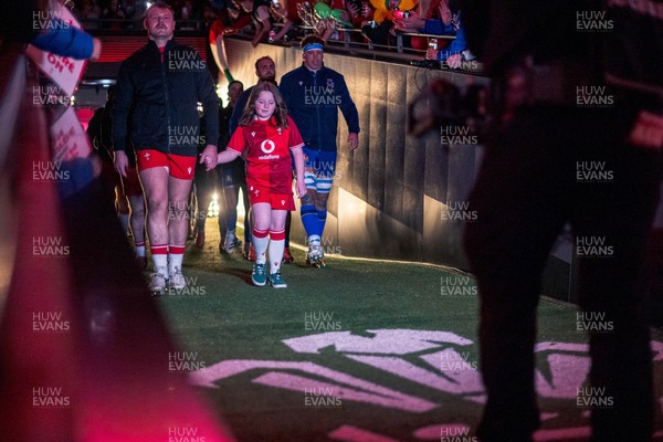 140326 - Wales v Italy - Guinness Six Nations - Dewi Lake of Wales leads the team out of the tunnel 