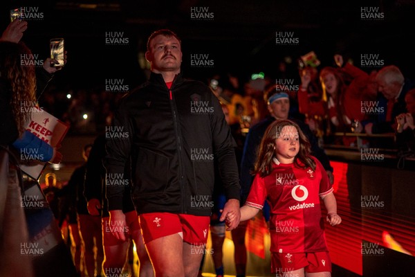 140326 - Wales v Italy - Guinness Six Nations - Dewi Lake of Wales leads the team out of the tunnel 