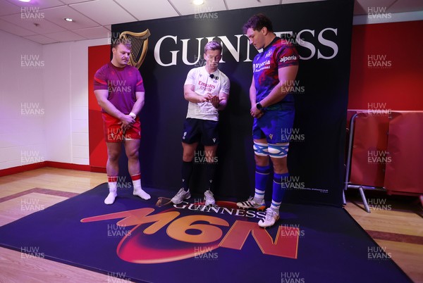 140326 - Wales v Italy - Guinness Six Nations Championship - Referee Christophe Ridley with captains Dewi Lake of Wales and Michele Lamaro of Italy during the coin toss