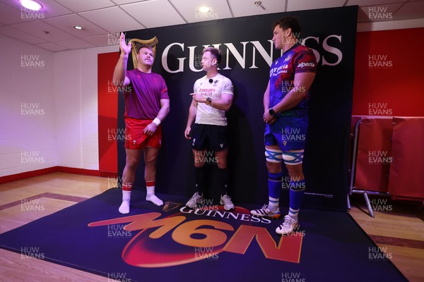 140326 - Wales v Italy - Guinness Six Nations Championship - Referee Christophe Ridley with captains Dewi Lake of Wales and Michele Lamaro of Italy during the coin toss