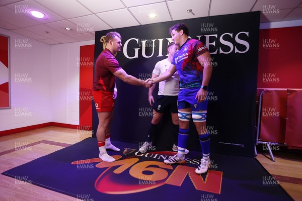 140326 - Wales v Italy - Guinness Six Nations Championship - Referee Christophe Ridley with captains Dewi Lake of Wales and Michele Lamaro of Italy during the coin toss