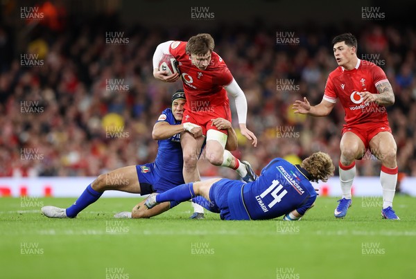 140326 - Wales v Italy - Guinness Six Nations Championship - Ellis Mee of Wales is tackled by Juan Ignacio Brex and Louis Lynagh of Italy 