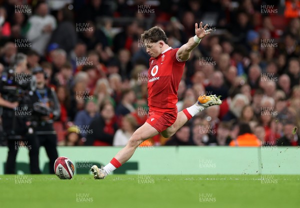 140326 - Wales v Italy - Guinness Six Nations Championship - Dan Edwards of Wales kicks the conversion