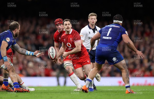 140326 - Wales v Italy - Guinness Six Nations Championship - Tomos Williams of Wales off loads the ball to James Botham