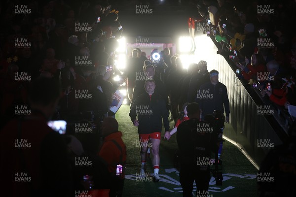 140326 - Wales v Italy - Guinness Six Nations Championship - Dewi Lake of Wales leads the teams out