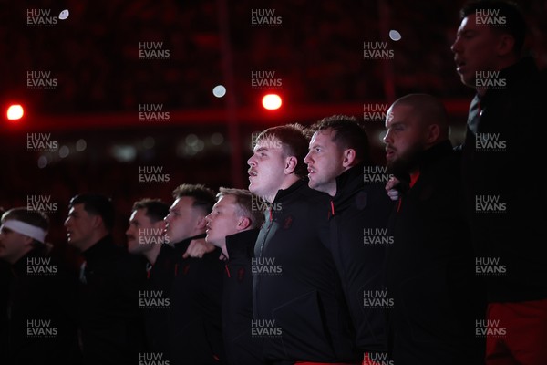 140326 - Wales v Italy - Guinness Six Nations Championship - Archie Griffin of Wales sings the anthem