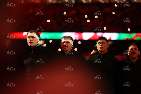 140326 - Wales v Italy - Guinness Six Nations Championship - Ben Carter, Aaron Wainwright, Louis Rees-Zammit and Tomos Williams of Wales sing the anthem