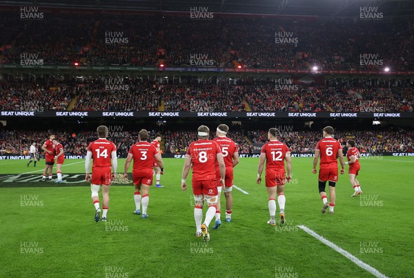 140326 - Wales v Italy - Guinness Six Nations Championship - Wales walk onto the field
