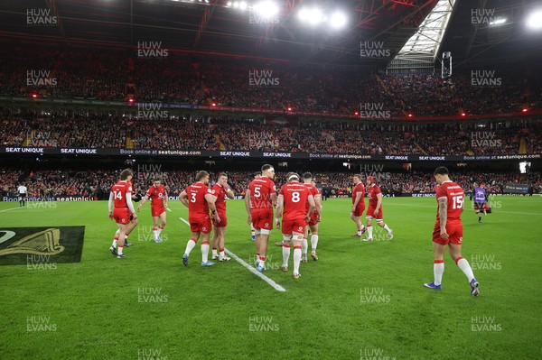 140326 - Wales v Italy - Guinness Six Nations Championship - Wales walk onto the field