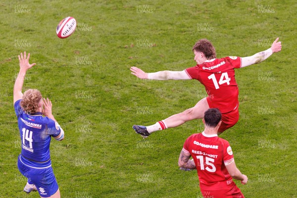 140326 - Wales v Italy - Guinness Six Nations - Ellis Mee of Wales kicks the ball