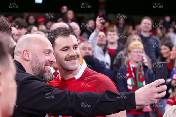140326 - Wales v Italy - Guinness Six Nations - Tomos Williams of Wales with fans at the end of the match