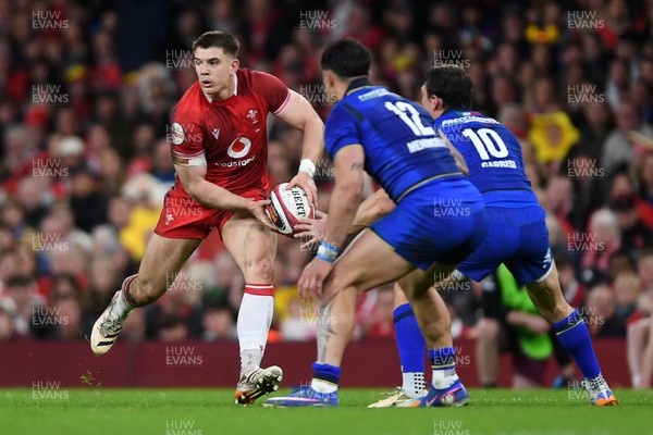 140326 - Wales v Italy - Guinness Men's Six Nations - Joe Hawkins of Wales is challenged by Tommaso ⁠Menoncello of Italy