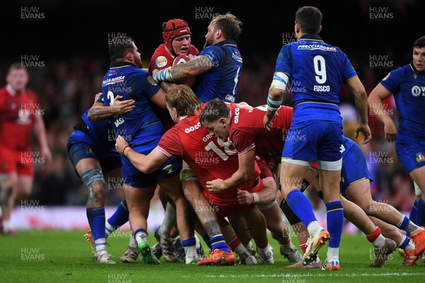 140326 - Wales v Italy - Guinness Men's Six Nations - James Botham of Wales is challenged by Niccolo Cannone of Italy