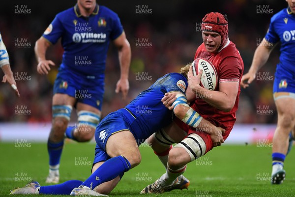 140326 - Wales v Italy - Guinness Men's Six Nations - James Botham of Wales is challenged by Louis Lynagh of Italy