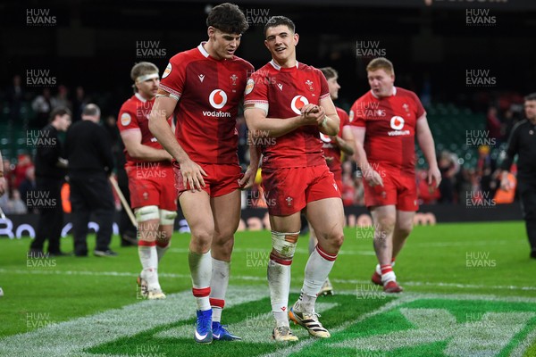 140326 - Wales v Italy - Guinness Men's Six Nations - Eddie James of Wales and Joe Hawkins of Wales celebrate the win at full time