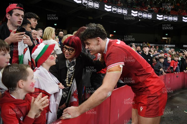 140326 - Wales v Italy - Guinness Men's Six Nations - Eddie James of Wales with fans at full time