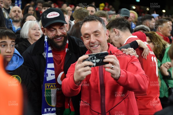 140326 - Wales v Italy - Guinness Men's Six Nations - Wales attack coach, Matt Sherratt with fans at full time