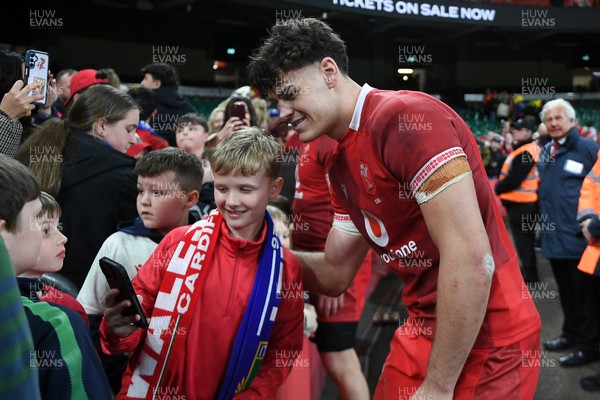 140326 - Wales v Italy - Guinness Men's Six Nations - Eddie James of Wales with fans at full time