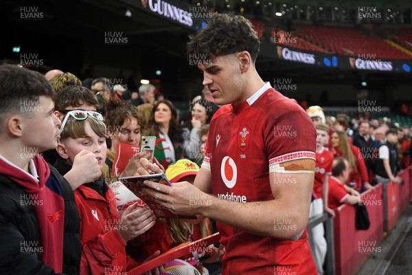 140326 - Wales v Italy - Guinness Men's Six Nations - Eddie James of Wales with fans at full time