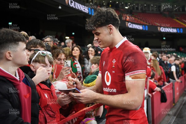 140326 - Wales v Italy - Guinness Men's Six Nations - Eddie James of Wales with fans at full time