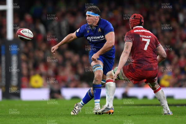140326 - Wales v Italy - Guinness Men's Six Nations - Michele Lamaro of Italy is challenged by James Botham of Wales
