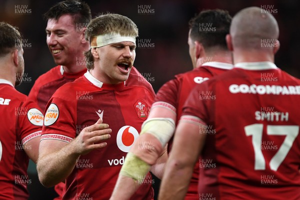 140326 - Wales v Italy - Guinness Men's Six Nations - Aaron Wainwright of Wales celebrates the win at full time