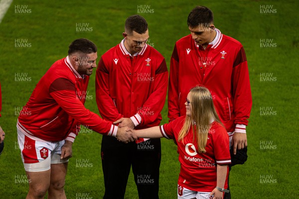 160324 - Wales v Italy - Guinness Six Nations - Wales Players greet the match Mascot 
