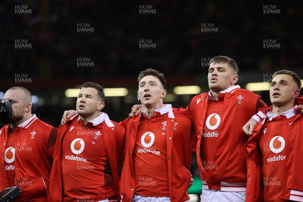 160324 - Wales v Italy - Guinness 6 Nations 2024 - Josh Adams of Wales sings the anthem