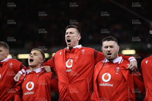 160324 - Wales v Italy - Guinness 6 Nations 2024 - Adam Beard of Wales sings the anthem