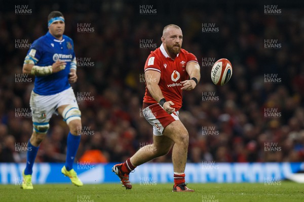 160324 - Wales v Italy - Guinness Six Nations - Dillon Lewis of Wales passes the ball