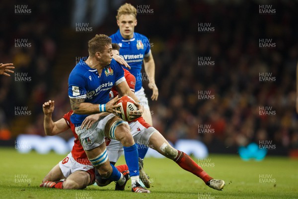 160324 - Wales v Italy - Guinness Six Nations - Lorenzo Cannone of Italy is tackled