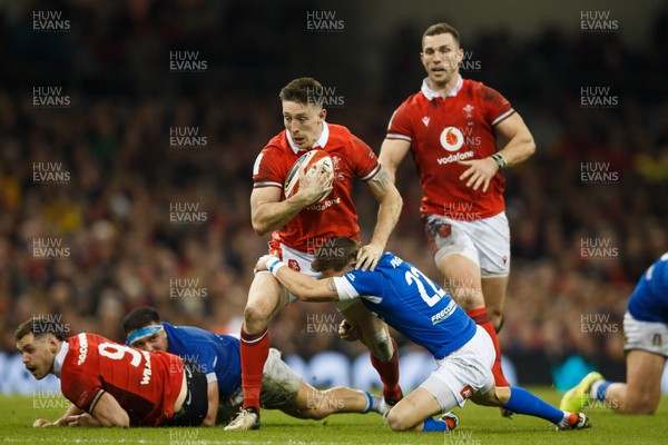 160324 - Wales v Italy - Guinness Six Nations - Josh Adams of Wales is tackled by Martin Page-Relo of Italy