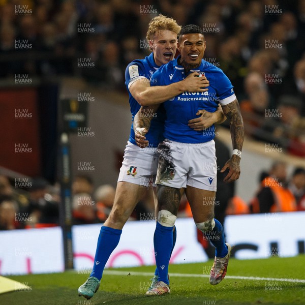 160324 - Wales v Italy - Guinness Six Nations - Monty Ioane of Italy celebrates with Louis Lynagh after scoring a try