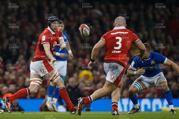 160324 - Wales v Italy - Guinness Six Nations - Adam Beard of Wales passes the ball