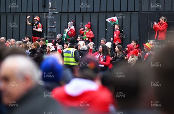 160324 - Wales v Italy - Guinness Six Nations - Fans look on as the Italy team bus arrives