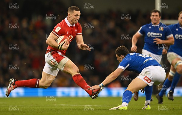 160324 - Wales v Italy - Guinness Six Nations - George North of Wales  looks to break past Paolo Garbisi of Italy  