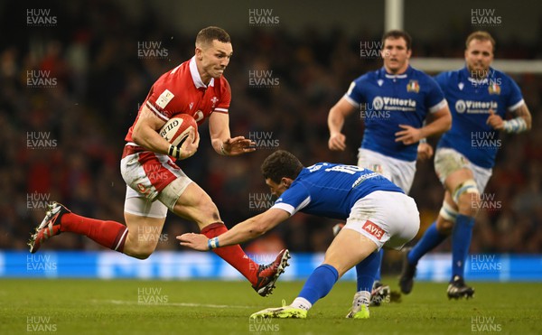 160324 - Wales v Italy - Guinness Six Nations - George North of Wales  looks to break past Paolo Garbisi of Italy  